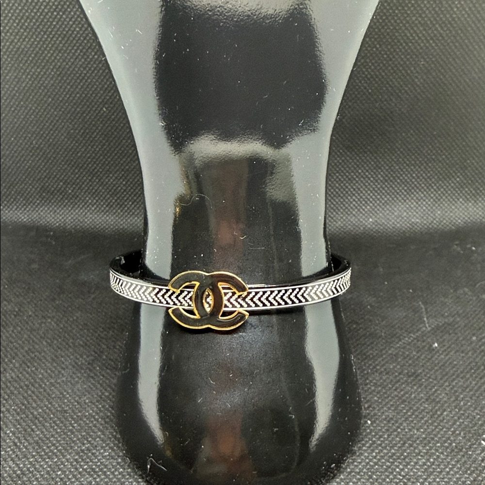 ✅ PRICE IS FIRM ✅ Fashion Black and Gold Bracelet with Logo